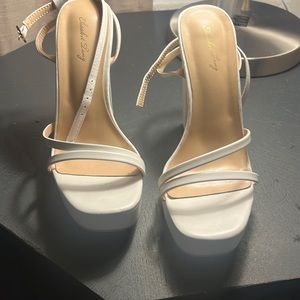 White ankle strap platform heels